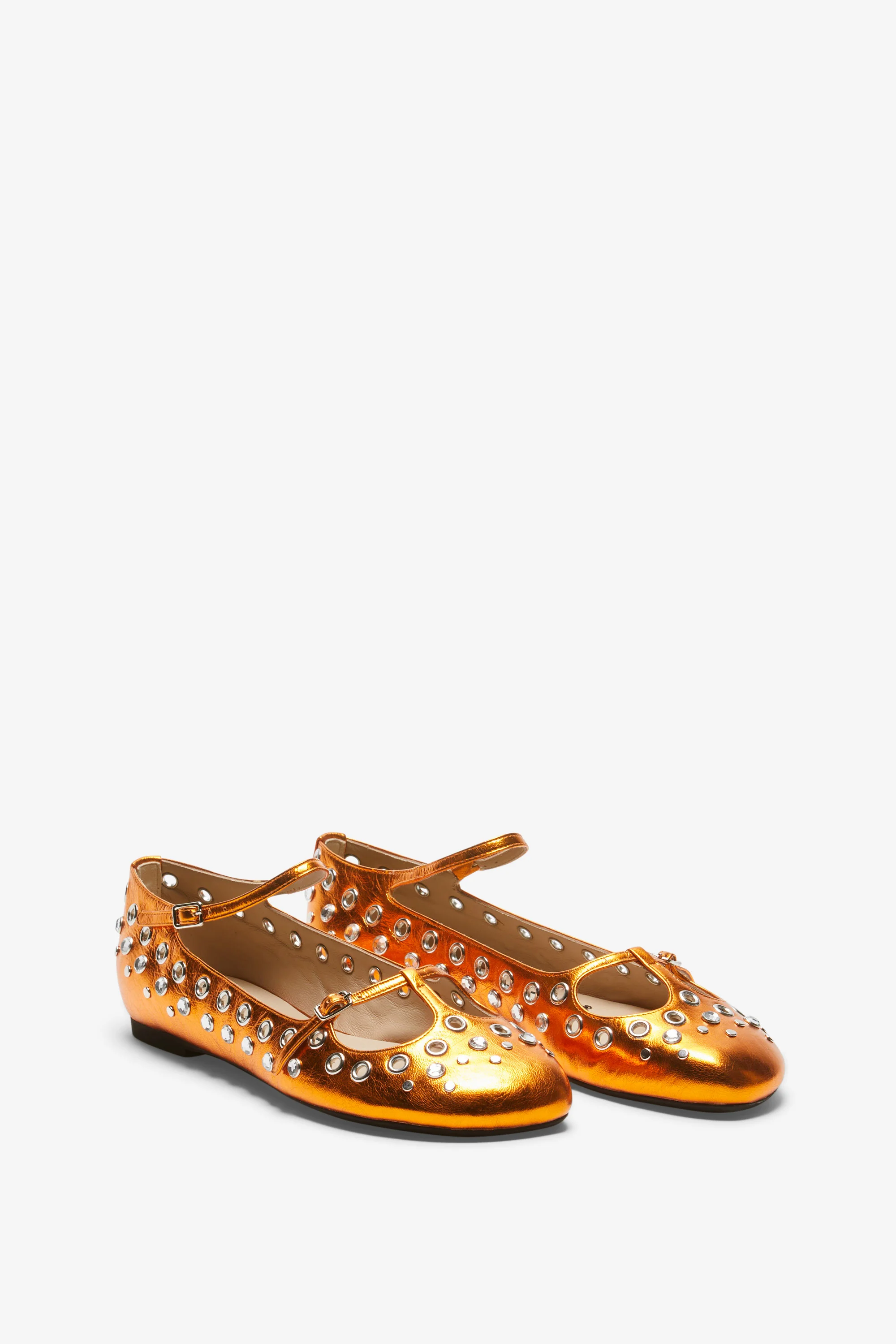 Ballerine punta tonda in pelle laminata con borchie